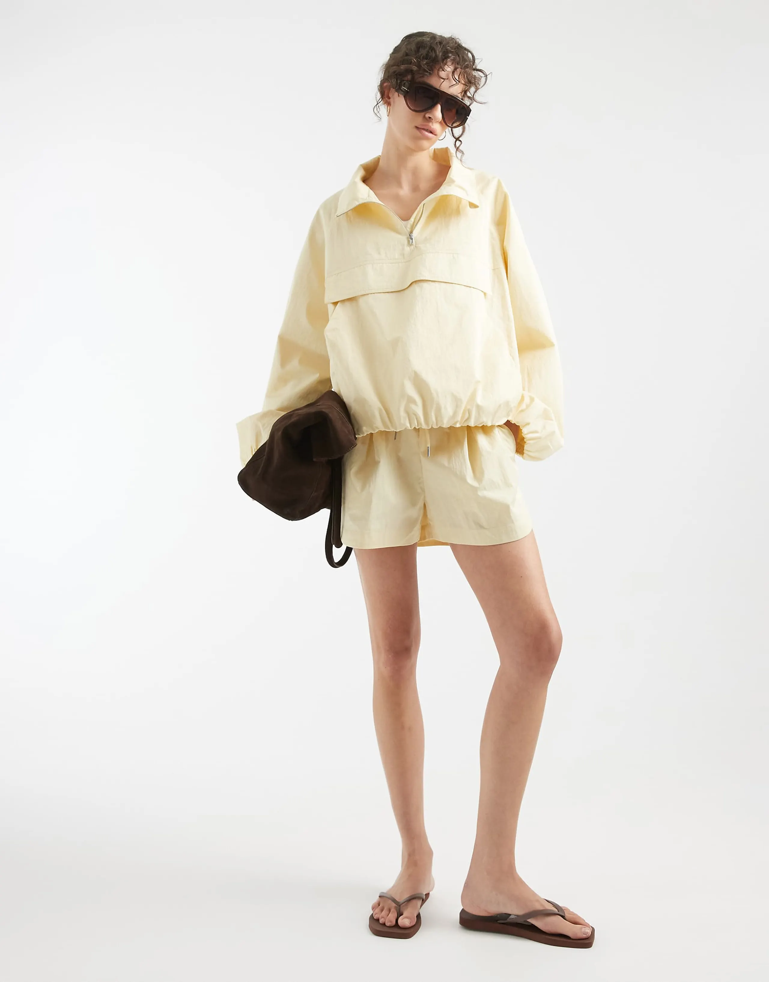 ASOS DESIGN oversized paper touch shorts in lemon yellow