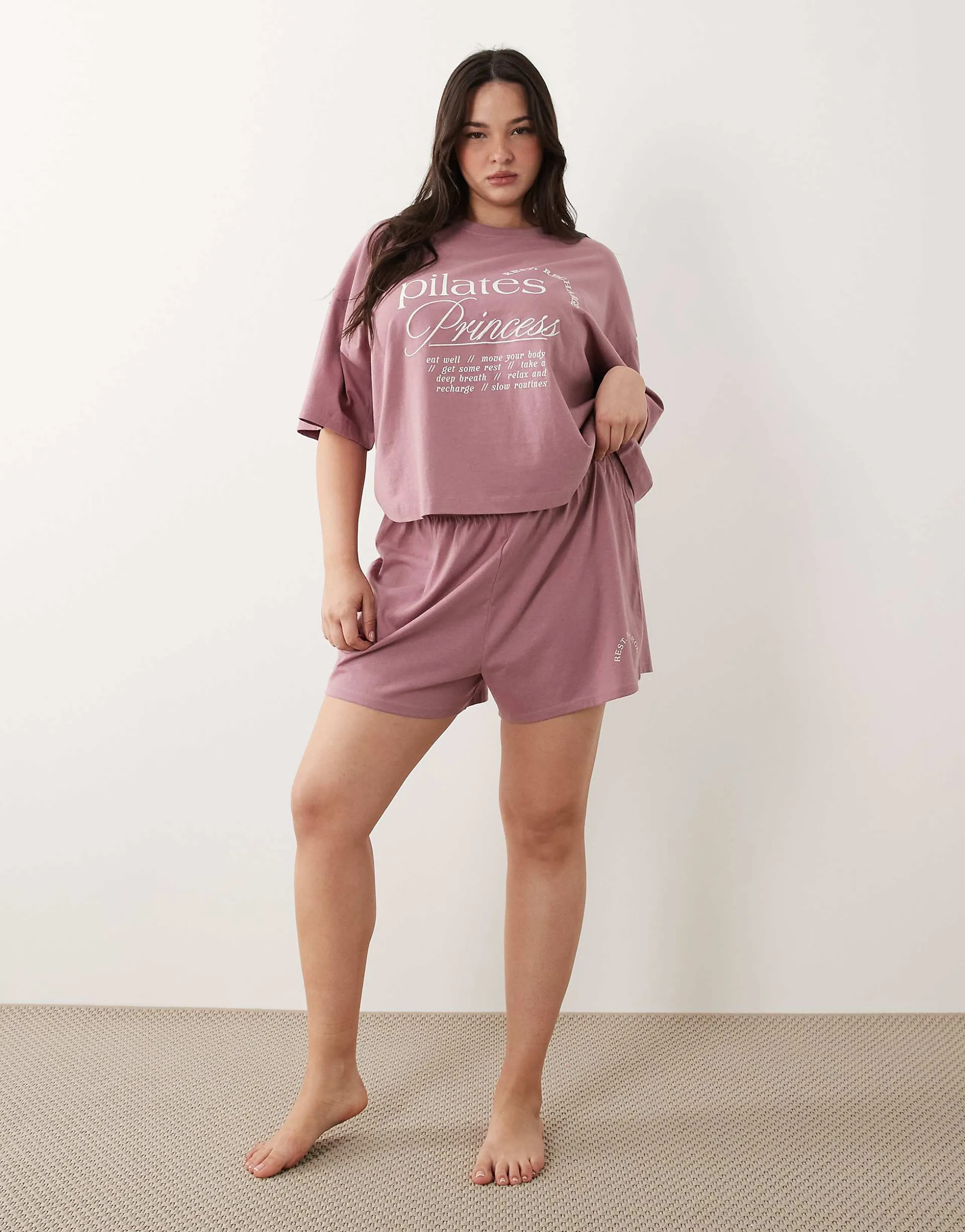 ASOS DESIGN Curve pilates princess graphic tee and shorts pajama set in pink