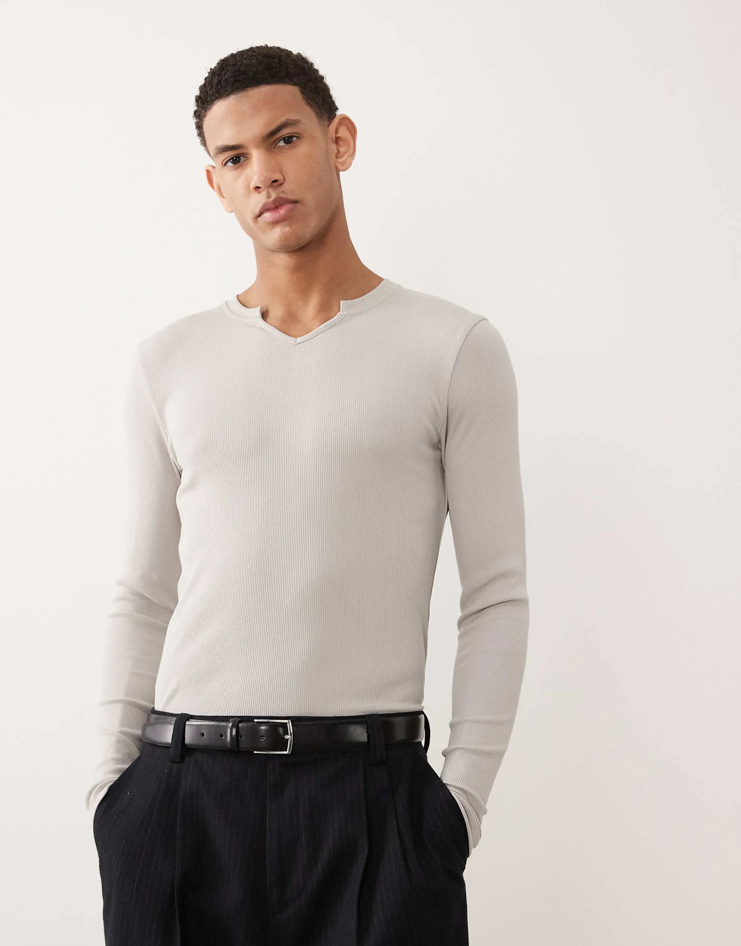 ASOS DESIGN muscle fit long sleeve t-shirt with notch neck in stone rib knit