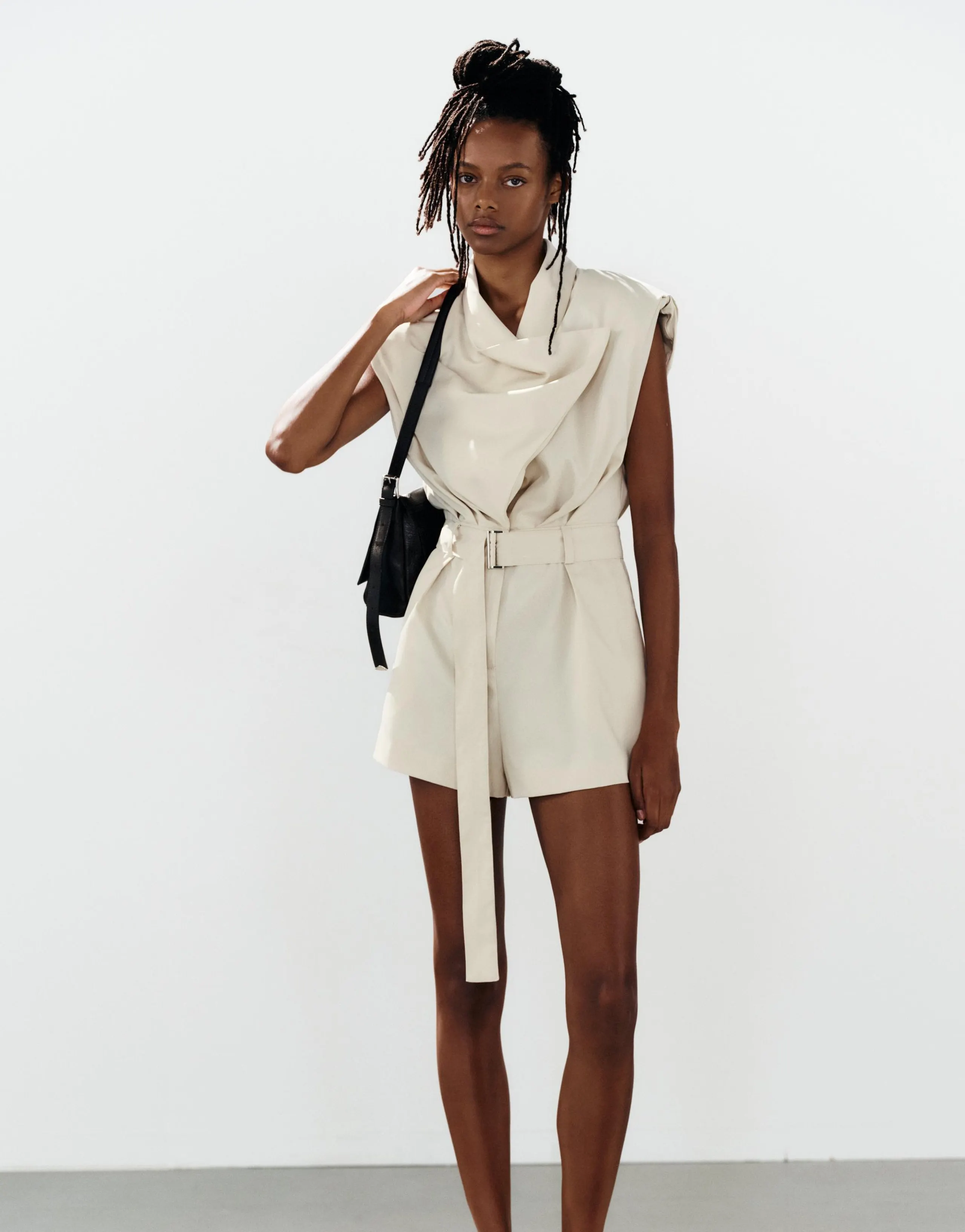 PLAYSUT WITH SHOULDER PADS AND BELT