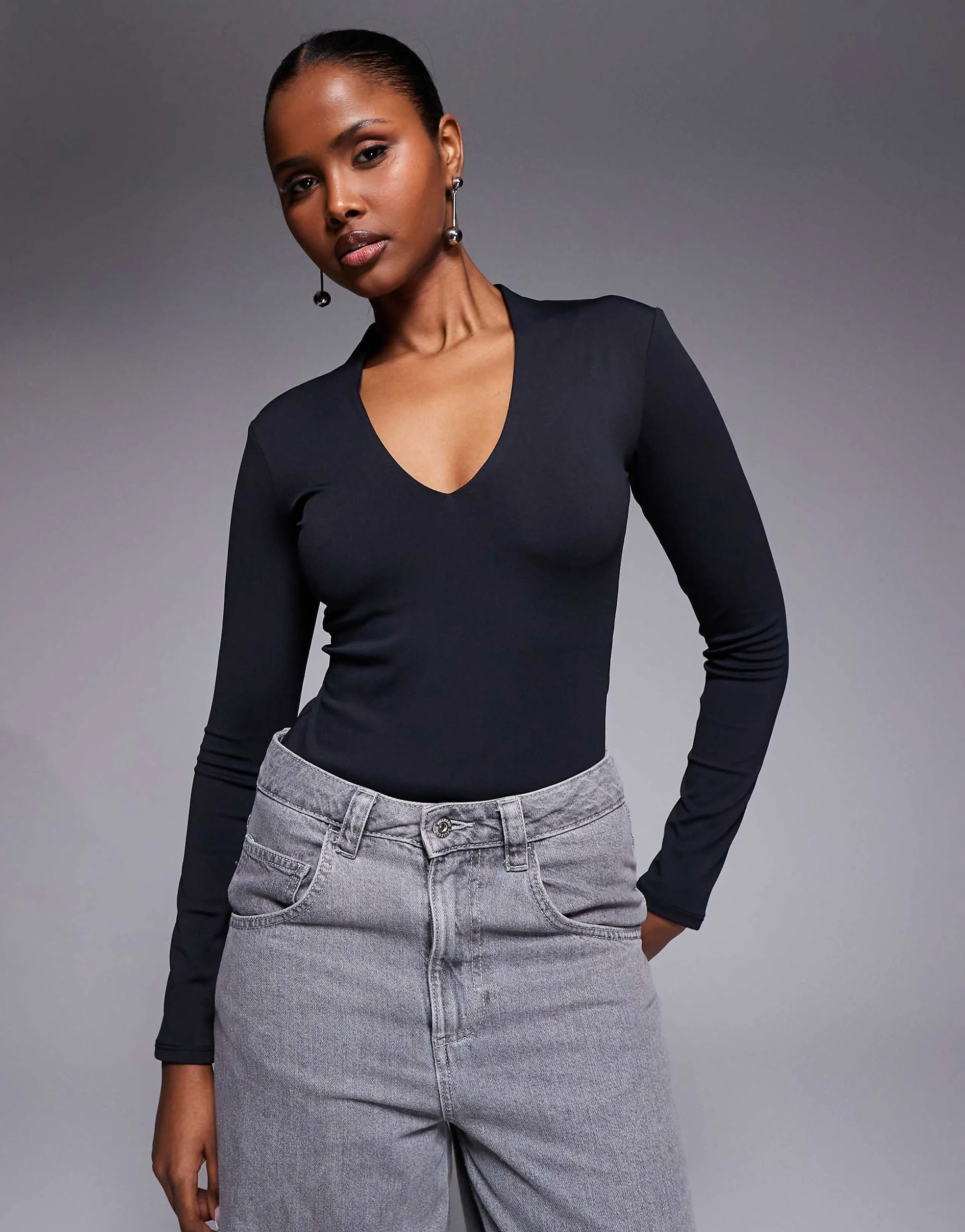 River Island long sleeve plunge polyamide bodysuit in black 