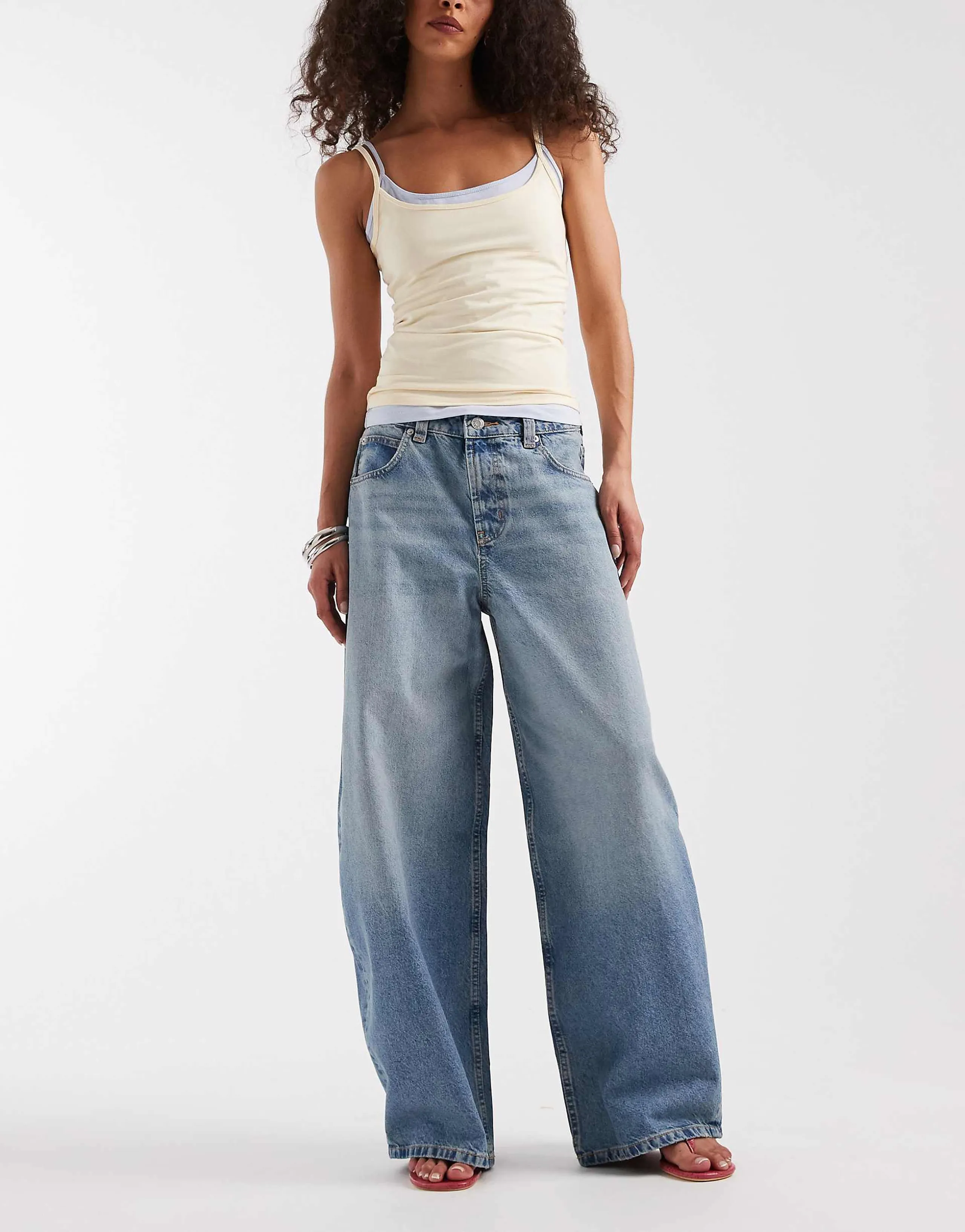ASOS DESIGN baggy horseshoe jeans in light mid wash