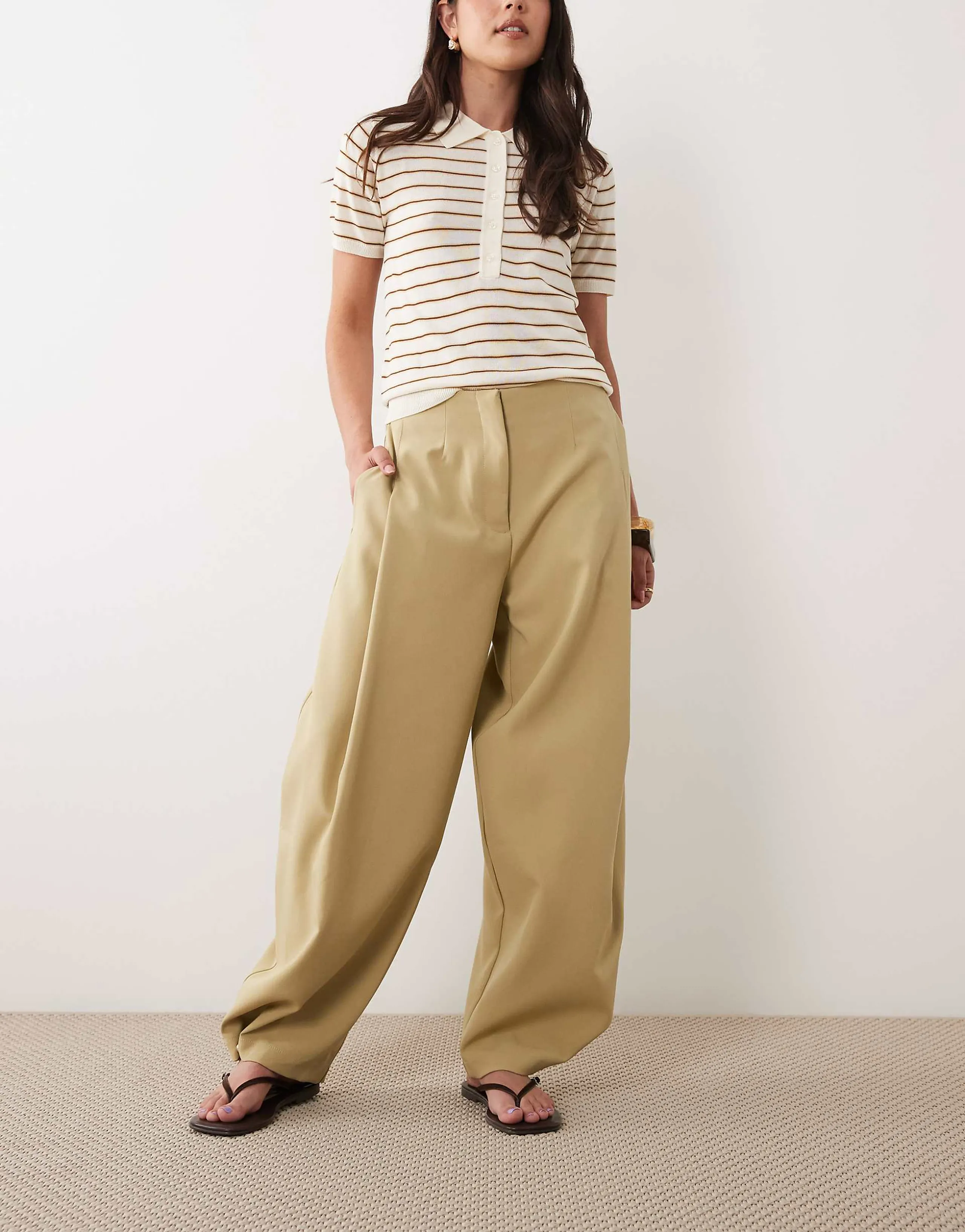 ASOS DESIGN Tailored tapered pants with snap hem detail in green
