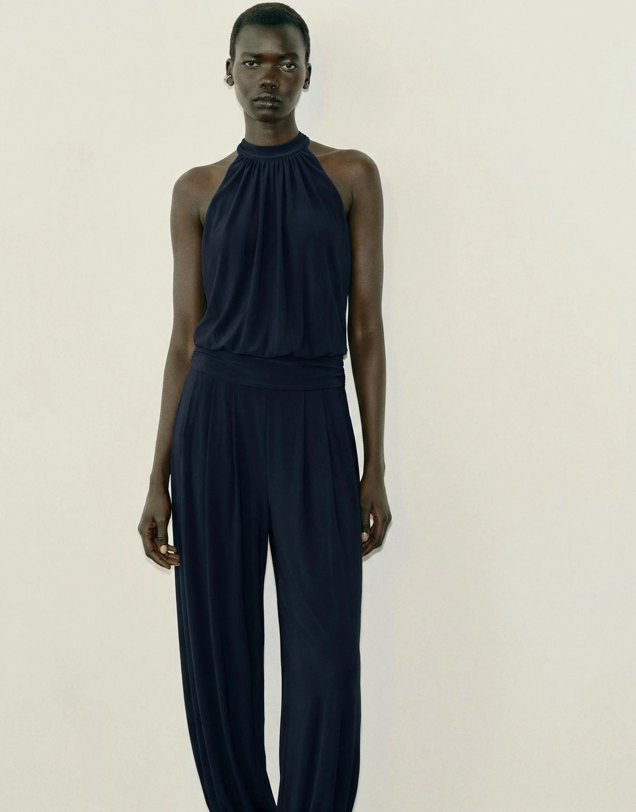 DRAPED HALTER SAROUEL JUMPSUIT